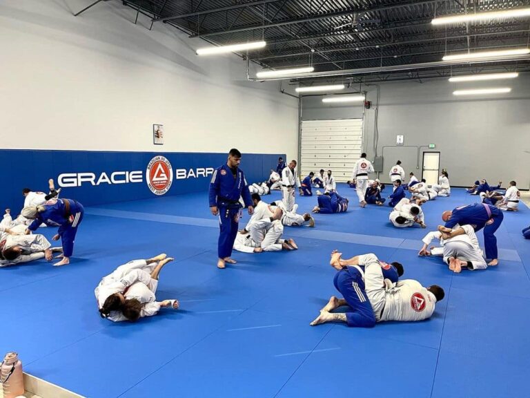 Professor Rodrigo with students on the mat at Gracie Barra West Jordan