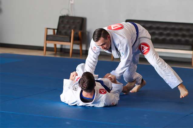 Two guys practicing Gi Jiu Jitsu class at Gracie Barra West Jordan